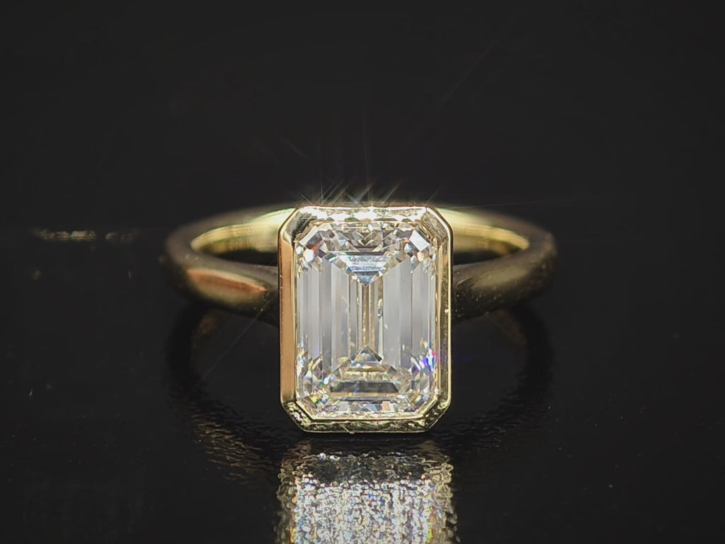 Emerald Bezel Engagement Ring